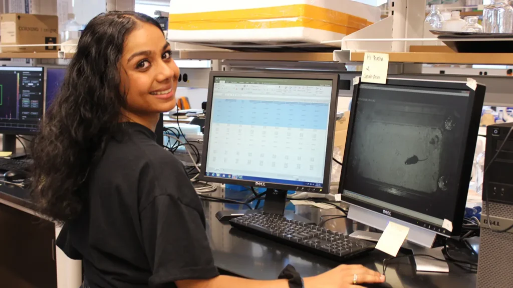 A graduate student working in a lab